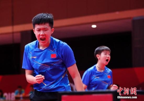 資料圖：雅加達(dá)亞運(yùn)會(huì)，王楚欽/孫穎莎奪得混雙冠軍。 <a target='_blank' href='/'>中新社</a>記者 劉關(guān)關(guān) 攝