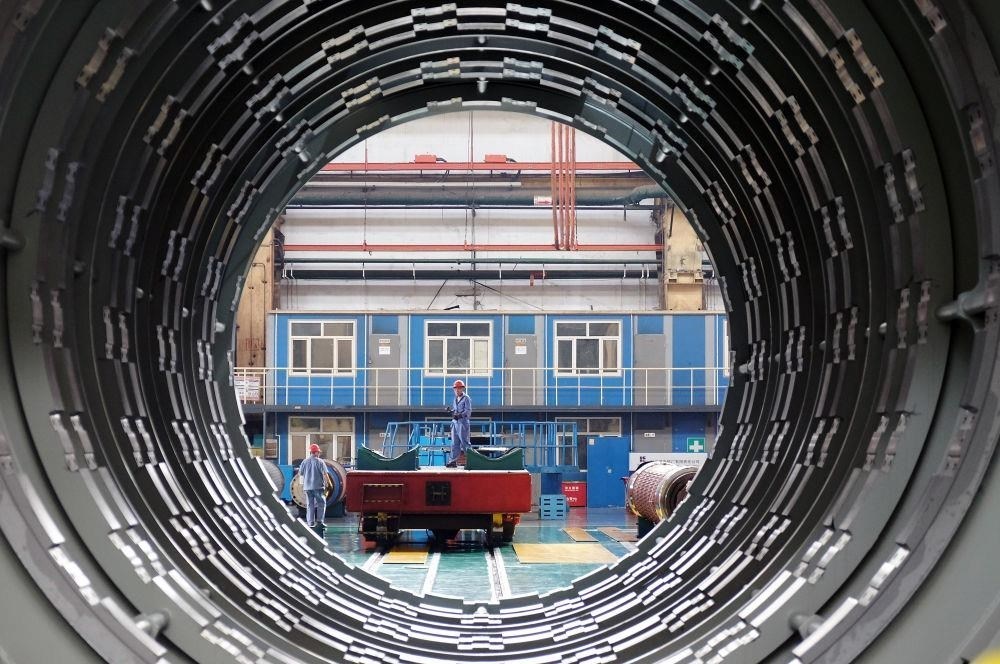 △2023年8月31日，工人在哈電集團哈爾濱電機廠有限責任公司的水電分廠重型車間作業(yè)。