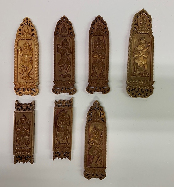 木雕牌飾（暫定名）。國(guó)家文物局供圖