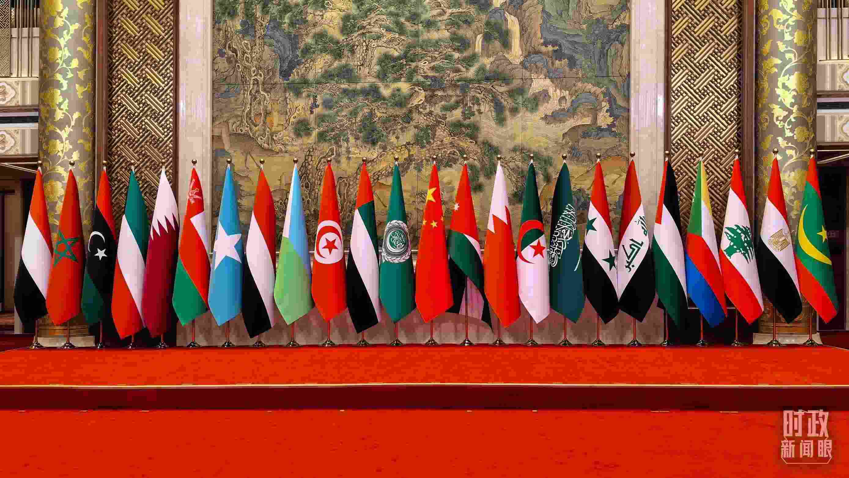 △會議現(xiàn)場的集體合影區(qū)。（總臺央廣記者潘毅拍攝）