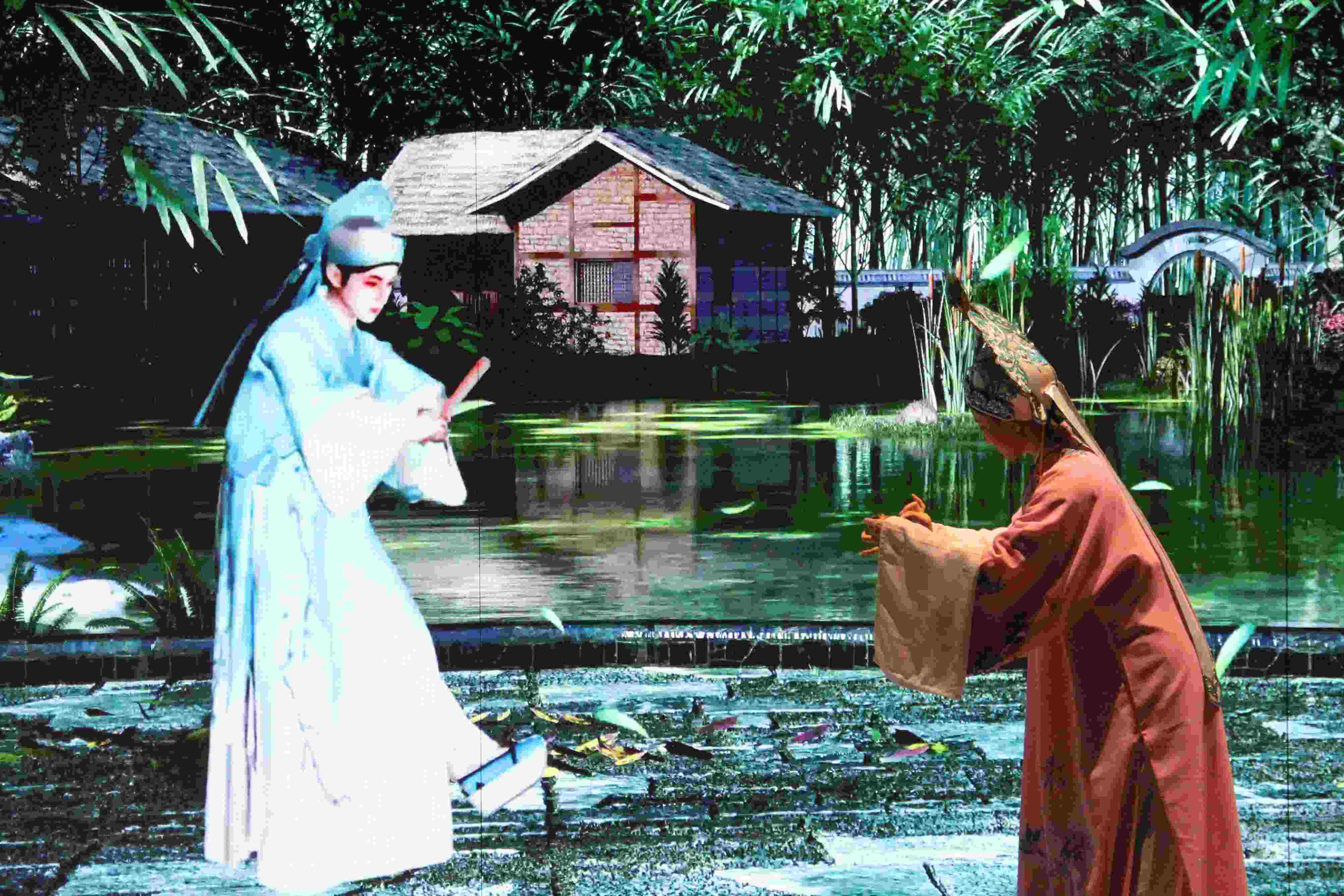 真人演員與虛擬人演員在“元啟金陵”南京數(shù)字文化客廳出演《梁山伯與祝英臺(tái)》經(jīng)典選段。受訪者供圖