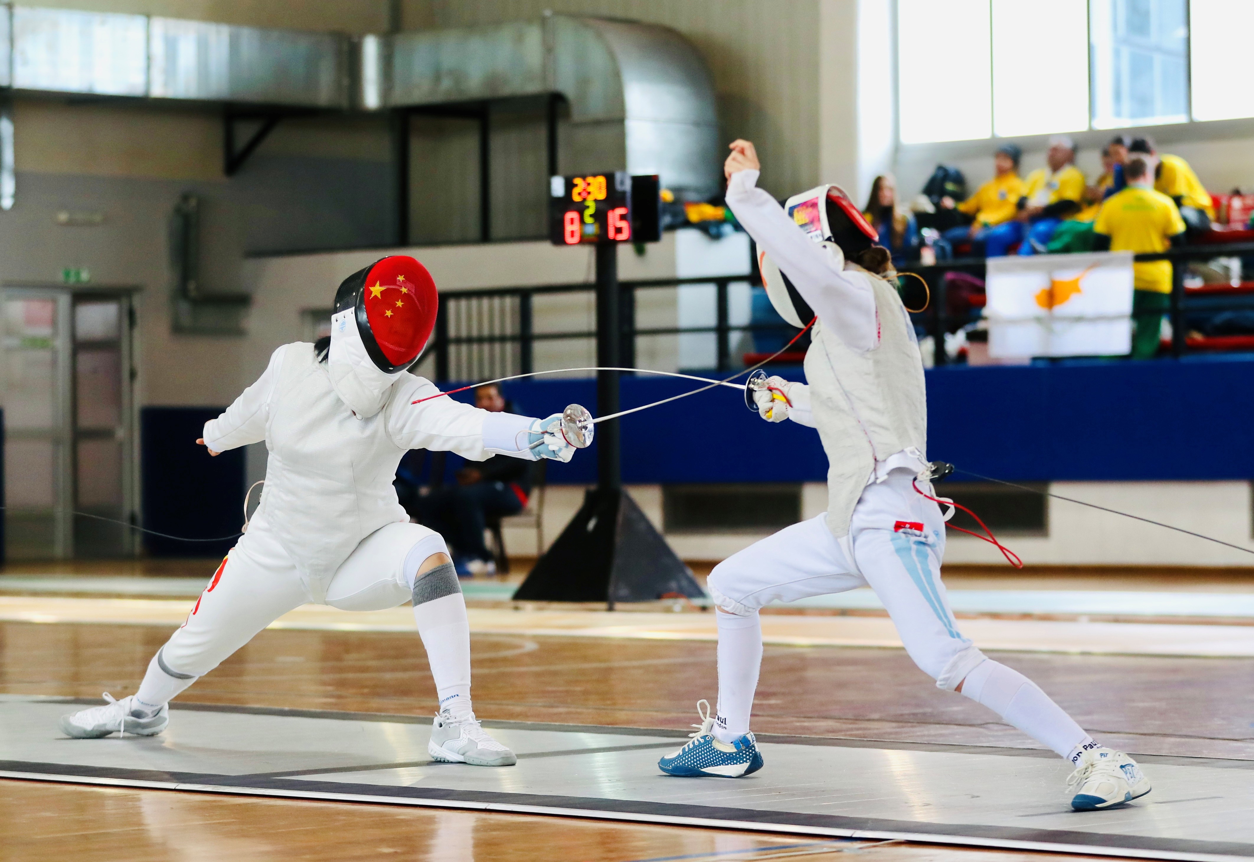 閔文珺（左）在比賽中。圖片來源：中國中學(xué)生體育代表團